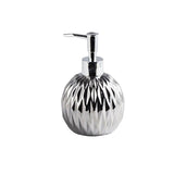 Silver soap dispenser