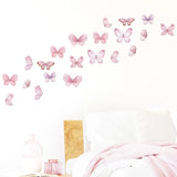 Photo of pink butterfly wall stickers on the wall of a bedroom