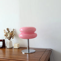 Stylish retro pink macaron style lamp on display on table