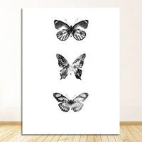 Three black and white butterflies wall art canvas print