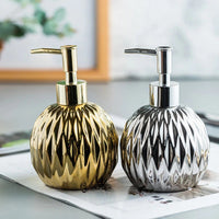 Gold and silver ceramic soap dispenser